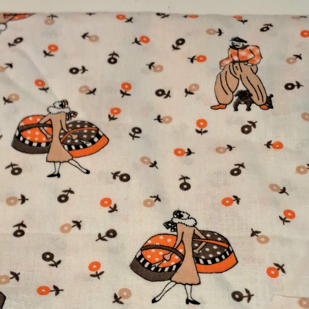white cream fabric with orange and brown flower design with a lady - Picture 2 of 2